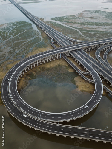 Aerial view of bridge in the sea photo