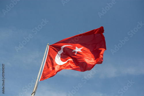 Turkish national flag hang on a pole in open air photo