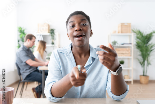 Black influencer talking to camera