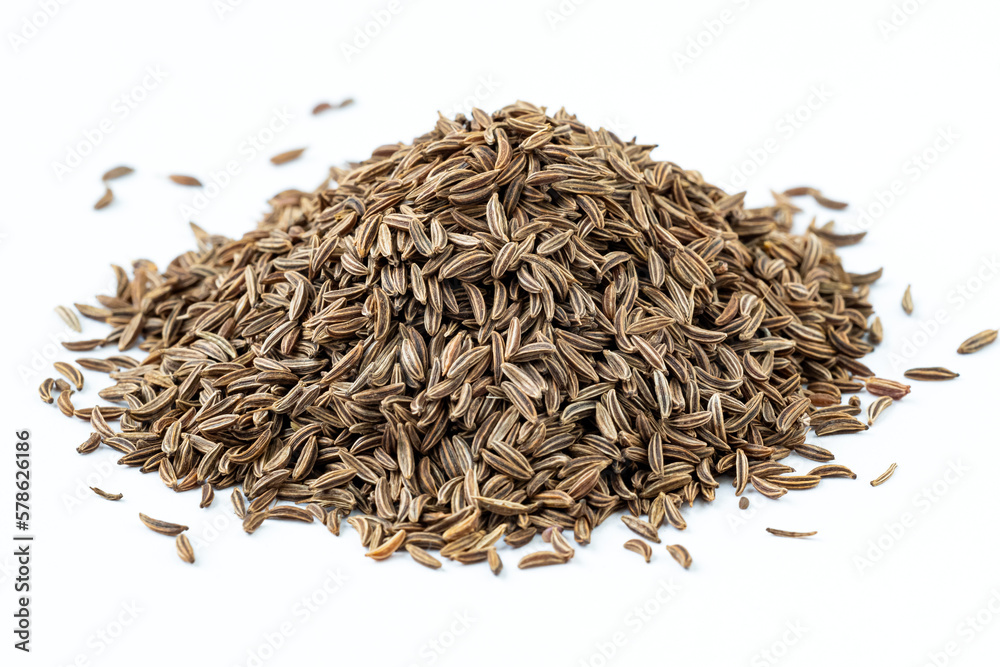 Cumin seeds. Pile of cumin seeds or caraway isolated on white background