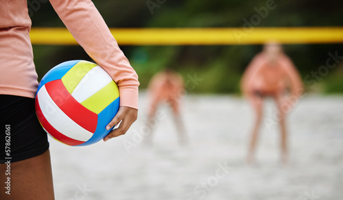 Volleyball, beach body or hand of woman playing a game in training or team workout in summer together. Sports fitness, zoom or healthy girl on sand ready to start a fun competitive match in Brazil