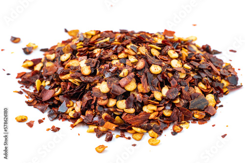 Red Pepper Flakes. Dried chili flakes and seeds isolated on white background