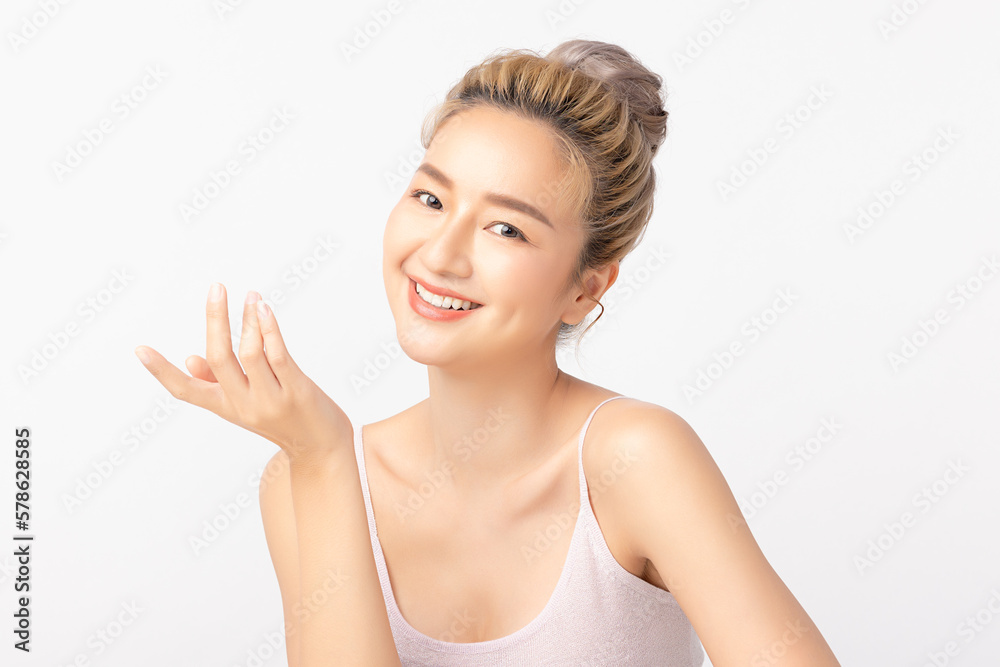 Happy beautiful asian woman showing empty copy space on the open hand. Asian girl beauty face skincare and health wellness, Facial treatment, Isolated on white background. Happy beautiful asian woman showing empty copy space on the open hand. Asian girl beauty face skincare and health wellness, Facial treatment, Isolated on white background.