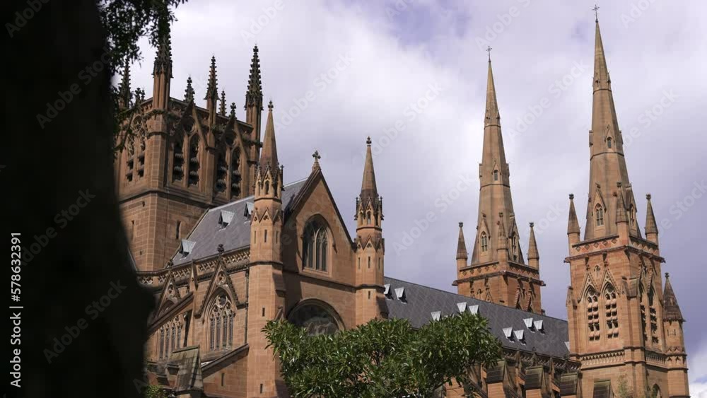 View of the St Mary's Cathedral in a nice sunny day, Sydney. The Metropolitan Cathedral of St Mary is the church of the Roman Catholic Archdiocese of Sydney. View of the St Mary's Cathedral in a nice sunny day, Sydney. The Metropolitan Cathedral of St Mary is the church of the Roman Catholic Archdiocese of Sydney.