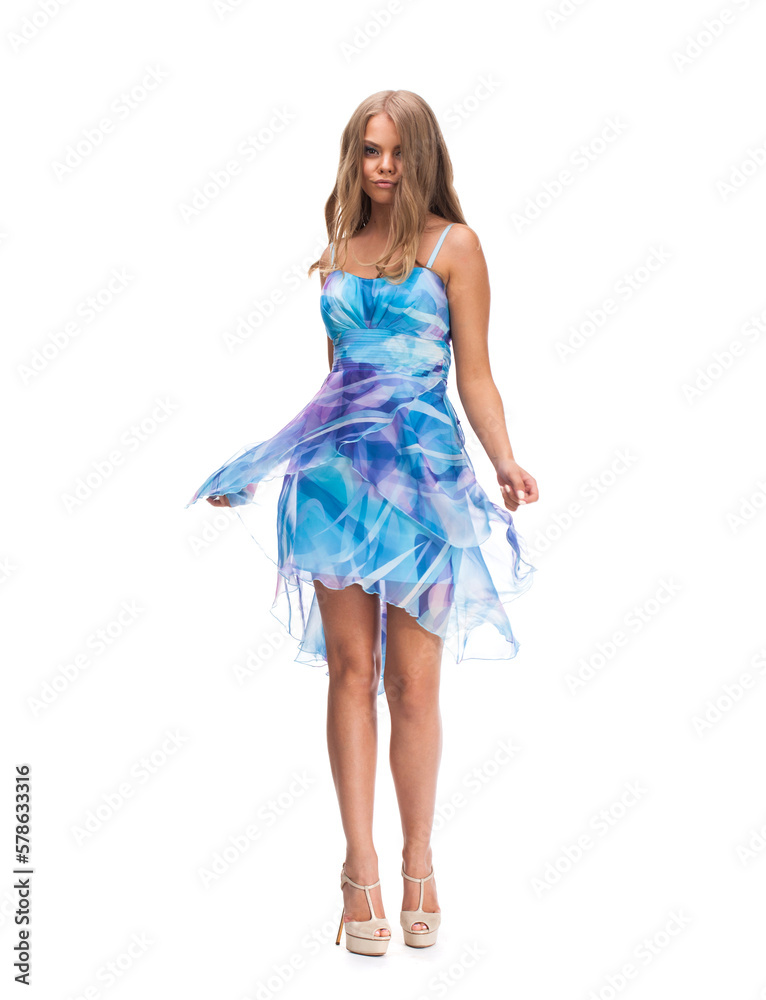 Young beautiful happy blonde woman in blue dress Young beautiful happy blonde woman in blue dress