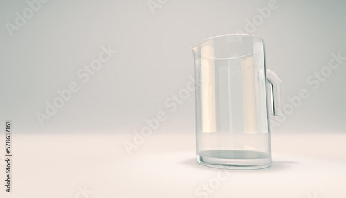 Empty glass jug or pitcher. Usually contains beer or water. On white studio backdrop.