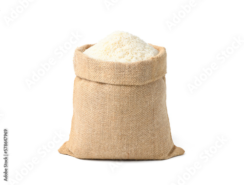 Jasmine rice in burlap sack bag isolated on white background. Fototapet