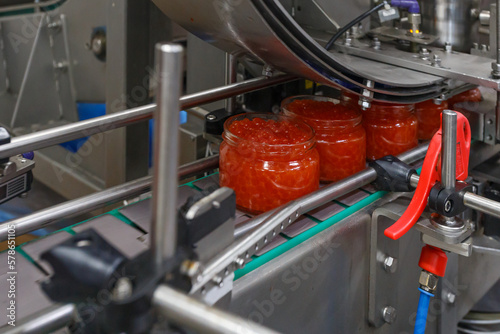 Special equipment for red caviar packaging.