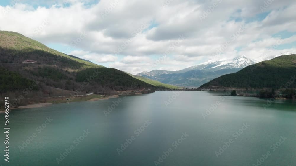 Flying Above Waters of Doxa Lake Greece between Pine Forests, Aerial Scenic Skyline of Mountainous Greek Hills Landscape, Travel and Tourism Destination Flying Above Waters of Doxa Lake Greece between Pine Forests, Aerial Scenic Skyline of Mountainous Greek Hills Landscape, Travel and Tourism Destination