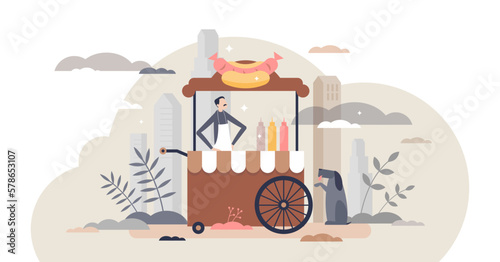 Hot dog stand and urban street food cart with junk meal tiny person concept, transparent background. Kiosk on wheels as fast eating service illustration. Bratwurst or wiener.
