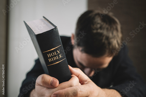 Holy Bible in men's hands. The concept of faith and religion. christian faith. photo