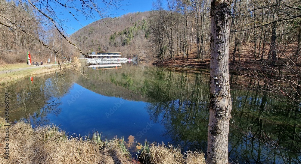 Thal, Graz, Austria-03.04.2023:Natural lake with new, modern building ...