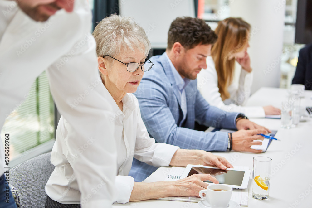 Business people at the conference table in a meeting Business people at the conference table in a meeting