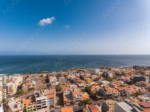 Aerial photos of Praia  the capital city of Santiago Island  Cabo Verde  reveal a bustling metropolis with a vibrant culture  stunning architecture  and breathtaking views of the Atlantic Ocean.
