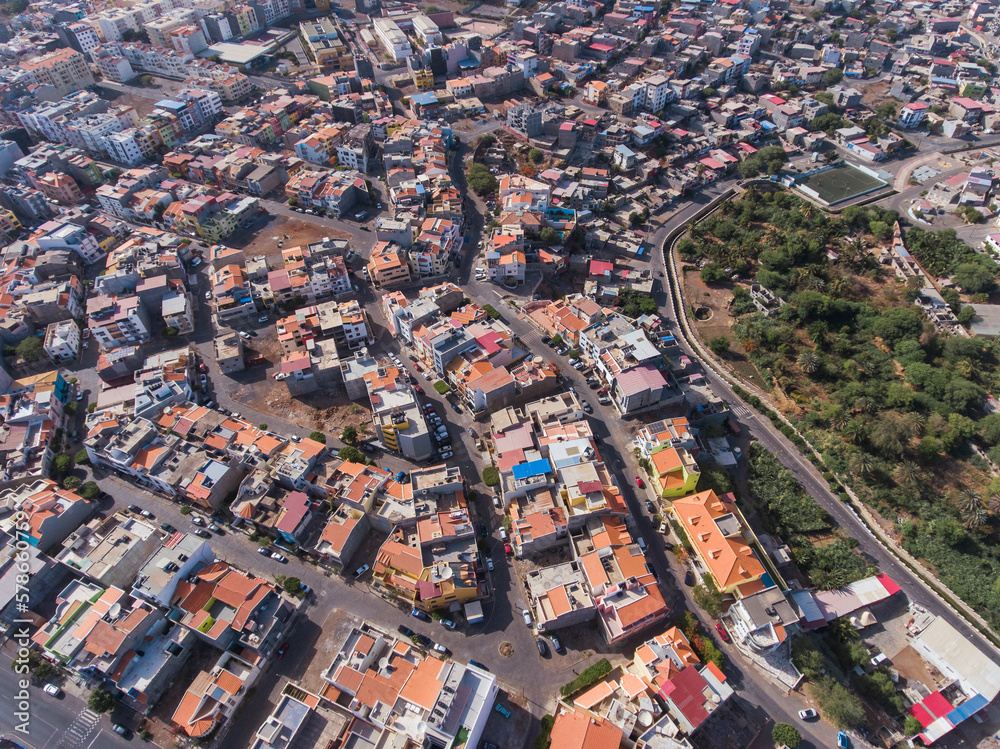 Aerial photos of Praia, the capital city of Santiago Island, Cabo Verde, reveal a bustling metropolis with a vibrant culture, stunning architecture, and breathtaking views of the Atlantic Ocean.