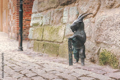 Sculpture of a goat near the Krakow Gate in Lublin photo