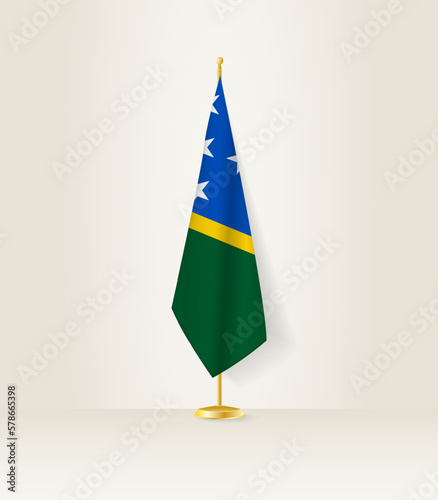 Solomon Islands flag on a flag stand.