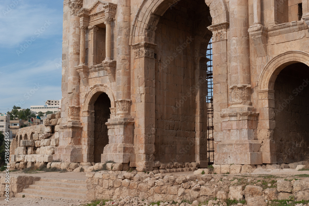 The Roman City of Gerasa (Jerash, Jordan). Triumphal arch of Hadrian with three vaulted arches was erected in 129 AD. Triumphal arch is main entrance to museum city and its most important attraction