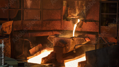 Картината върху платно Process of pouring liquid hot copper into molds.