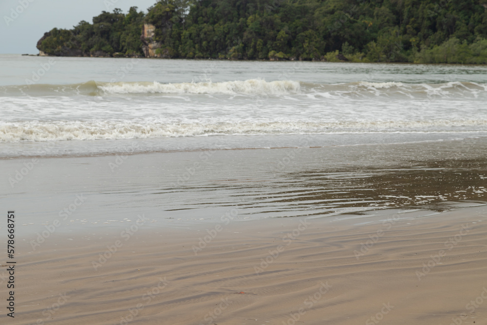 Bako national park, sea sandy beach, overcast, cloudy day, sky and sea. Vacation, travel, tropics concept Bako national park, sea sandy beach, overcast, cloudy day, sky and sea. Vacation, travel, tropics concept