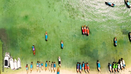 Drone is flying over a magnificent tropical paradise island, Phi phi island, Krabi, Thailand. One of the most beautiful attractions in the world. beach video background. Nature concept. photo