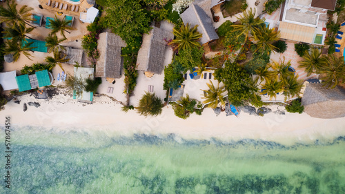 The turquoise ocean water and the luxurious resort on Kiwengwa beach in Zanzibar, Tanzania, are captured in this gorgeous toned aerial view. The scenery is simply stunning, and it's a perfect destinat © Sebastian