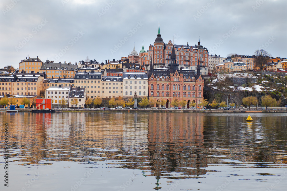 Stockholm Gamla Stan buildings at waterfront with reflections, Sweden