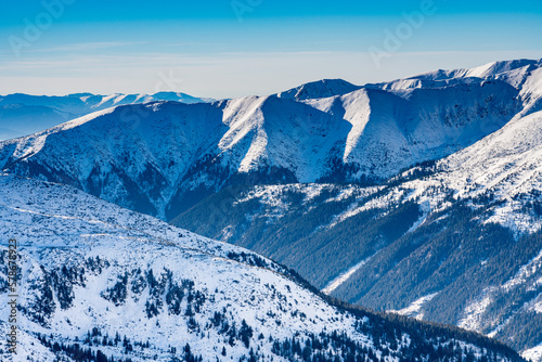 Poland 2022. Beautiful view on the snow Tatry.
Zakopane, Giewont, Kasprowy Wierch, Swinica, Rysy, Kresanica photo