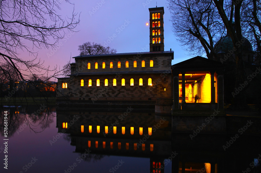 Evening view of the Protestant Church of Peace (Friedenskirche) in Sanssouci Park, Potsdam, Germany