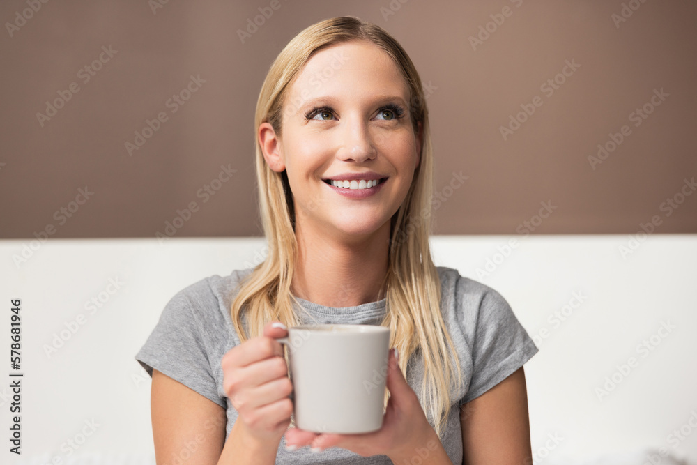 Cheerful blonde girl lady holding fresh hot coffee smiling saying thank you to boyfriend. Happy morning waking up in the morning in good mood. Cheerful blonde girl lady holding fresh hot coffee smiling saying thank you to boyfriend. Happy morning waking up in the morning in good mood.