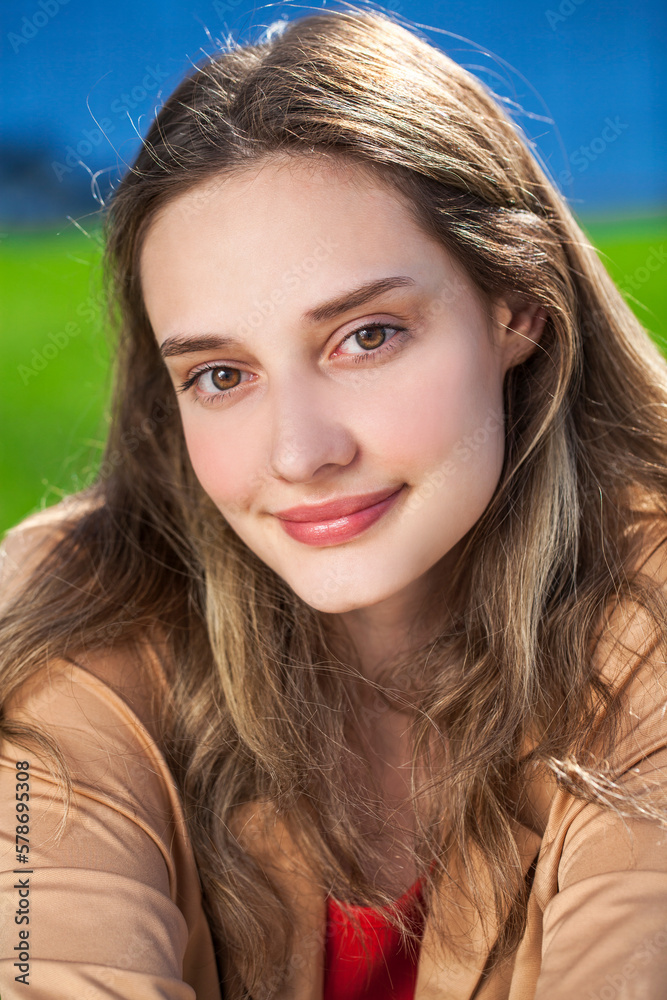 Portrait of a young beautiful woman, summer park outdoor Portrait of a young beautiful woman, summer park outdoor