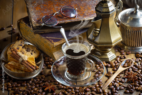 Fototapeta Naklejka Na Ścianę i Meble -  Espresso coffee with coffee beans on old background.