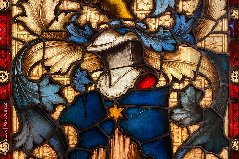 Stained glass window of knight. Detail