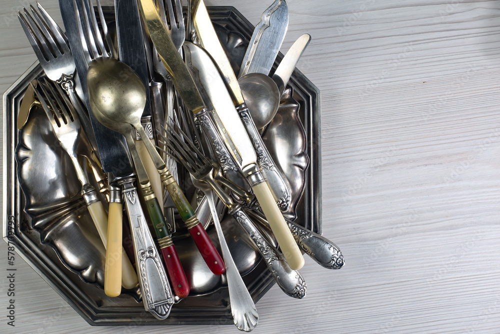 Fototapeta premium Silverware on an old background.