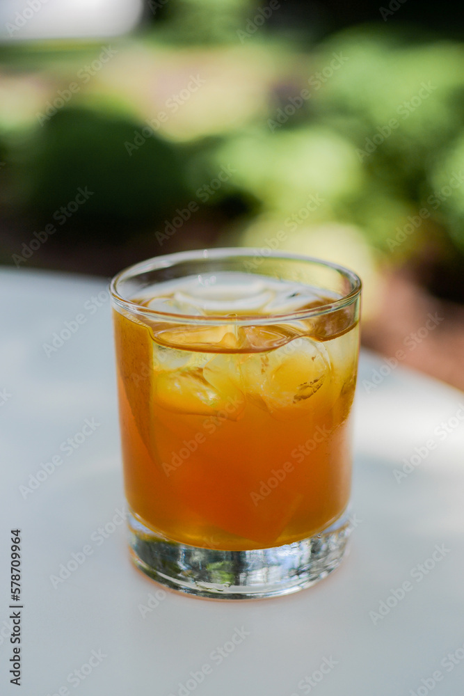 Trendy summer drinks with fruit close up. Refreshing homemade cocktails summer drinks, selective focus. Sunny day shadows Trendy summer drinks with fruit close up. Refreshing homemade cocktails summer drinks, selective focus. Sunny day shadows