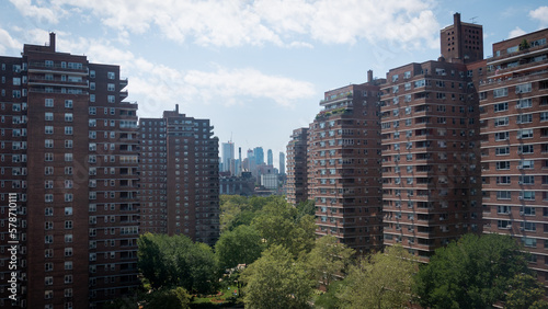 Lower East Side apartment blocks in New York with skyscrapers visible in the background. photo