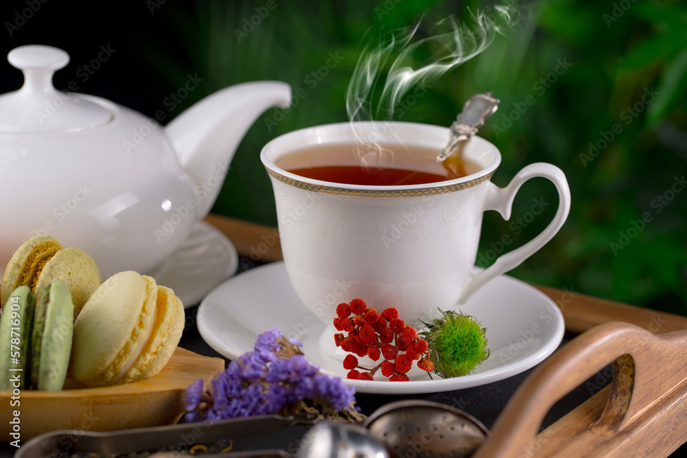 Fototapeta premium Sweet, hot tea with dessert, on an old background.