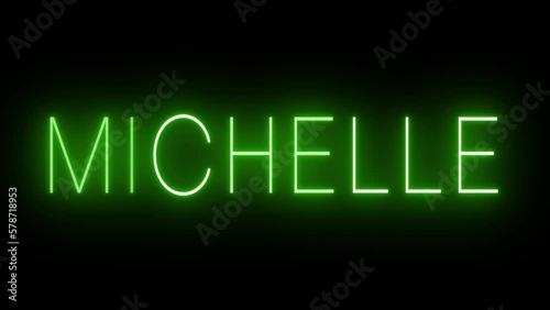 Flickering green retro style neon sign glowing against a black background