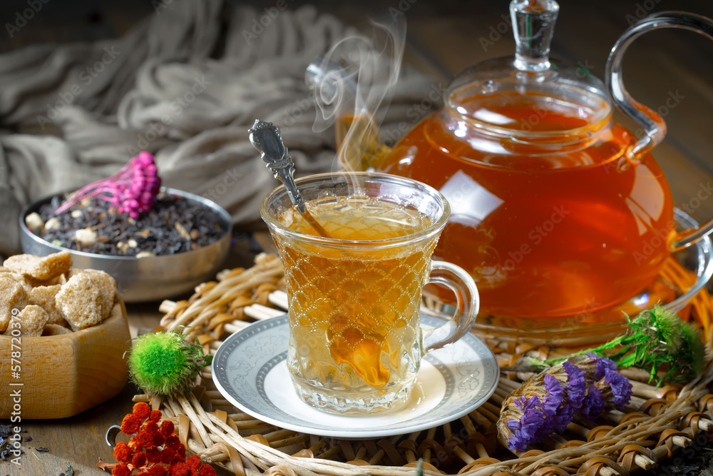 Sweet, hot tea with dessert, on an old background. Sweet, hot tea with dessert, on an old background.