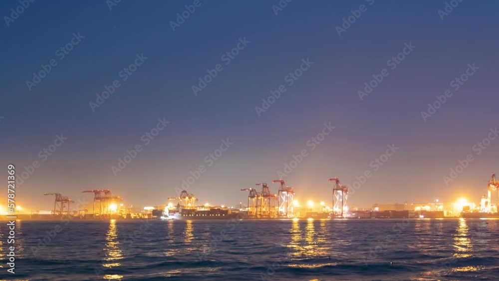 A dusk timelapse of cityscape near the container port in Tokyo panning A dusk timelapse of cityscape near the container port in Tokyo panning