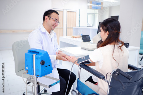 Male doctors treat patients, mother and child.