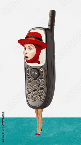 Contemporary modern artcollage about strange woman and retro mobile phone. Female stick out from gadget screen. Vintage objects photo