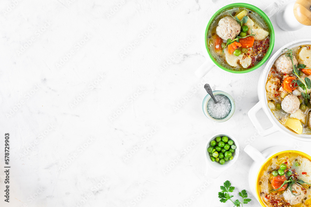 Spring bright soup with meatballs and vegetables. Copy space.