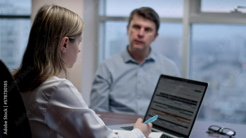 Woman doctor in office talking with patient and listening his complaints. Conversation on appointment with medical worker to get a prescription. Woman doctor in office talking with patient and listening his complaints. Conversation on appointment with medical worker to get a prescription.