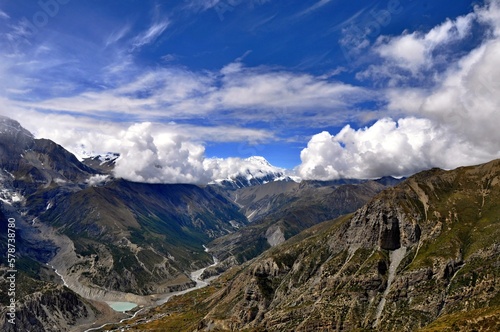 View of the Marshyangdi (Marsyangdi) River valley. Rocky valley of the Marshyangdi river with blue sky in the background. Manang District, Nepal, Asia.