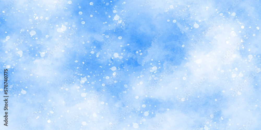 Abstract light blur defocused blue background with bokeh, Beautiful winter background of snow floating into air randomly, light blue bokeh background for wallpaper, invitation, cover and design.	