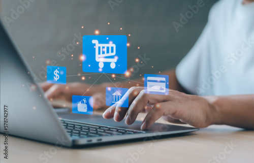 concept of online shopping and payment digital bank electronic wallet, man using a notebook computer to shop online credit card payment digital marketing technology or e commerce