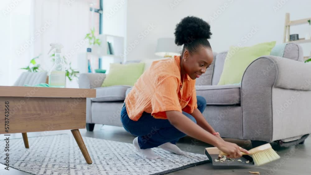 Sweeping, cleaning and black woman in home living room to remove dust ...