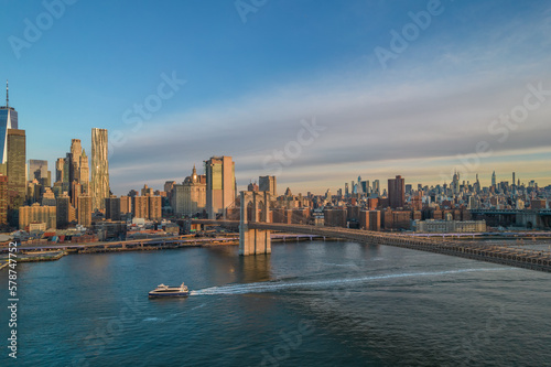 Manhattan bridge ferry ride during sunrise in NYC