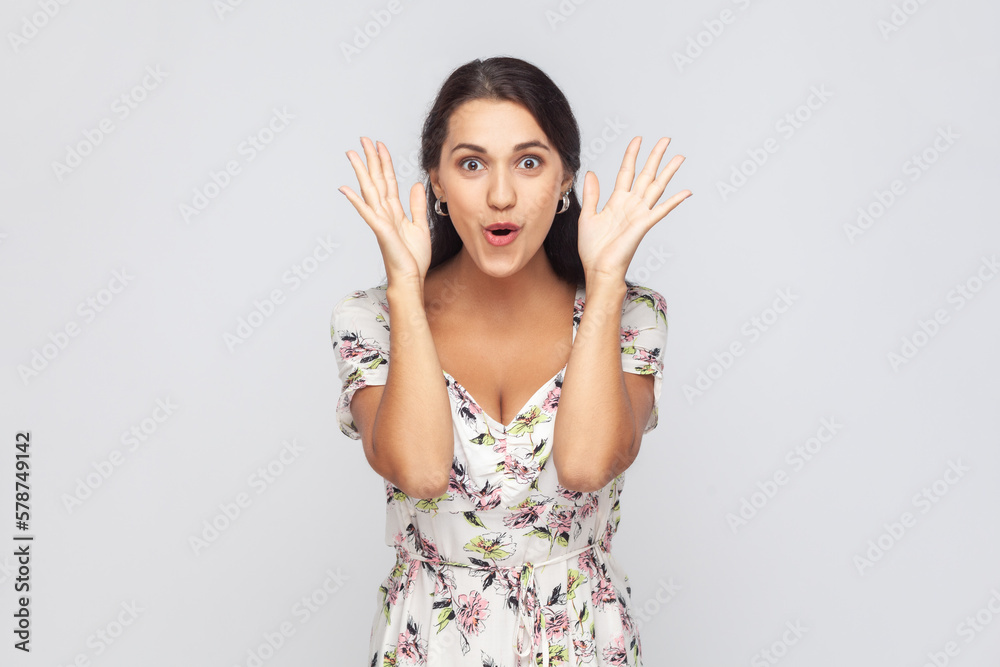 Woman standing with mouth open in surprise, has shocked expression, hears unbelievable news. Woman standing with mouth open in surprise, has shocked expression, hears unbelievable news.